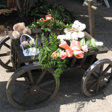 Dark Brown stained Medium wagon (aluminum wheel bands not available)