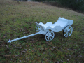 In White, with Amish made heavy duty hickory wheels- banded in steel- an additional cost