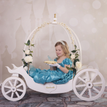 In White, with gold trim. The "Cinderella" name on side heart is custom