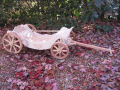 Unfinished and ready to paint, and with custom back rest and safety side rails